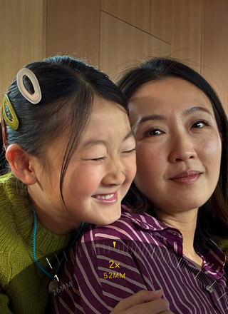 Der 2x Tele-Zoom Modus wird verwendet, um auf einen mit B�umen und Pflanzen bedeckten Berg einzuzoomen