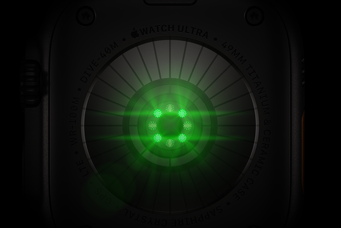 Rückseite der Apple Watch Ultra 4, Titangehäuse, Farbe Schwarz, mehrere runde Sensoren mit grün leuchtenden LEDs
