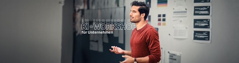 Mann mit rotem Shirt macht einen KI-Workshop für Unternehmen