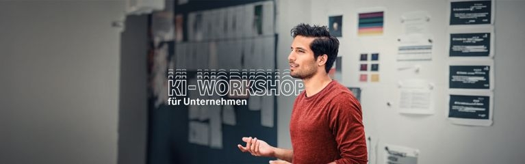 Mann mit rotem Shirt macht einen KI-Workshop für Unternehmen