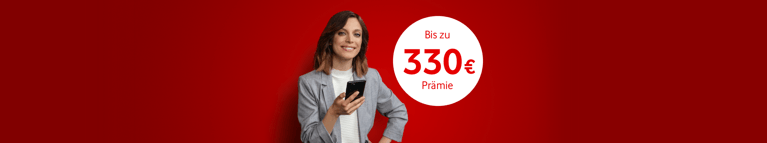Person im grauen Blazer mit Smartphone vor rotem Hintergrund, daneben ein weißer Kreis mit "Bis zu 265 € Prämie" Text.