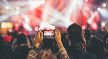 Taking photo at a music concert