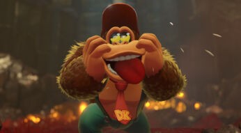 In diesem Bild aus einem der neuen Donkey Kong-Spiele streckt Donkey Kong seine Zunge heraus und zieht eine Grimasse. Er trägt eine rote Krawatte mit den Initialen „DK“.