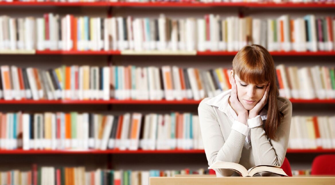 Young student in a library