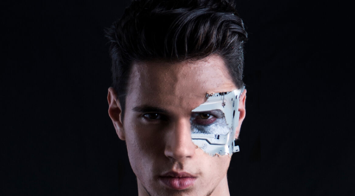 Close up Attractive Bare Muscled Man with Robotic Skin Art