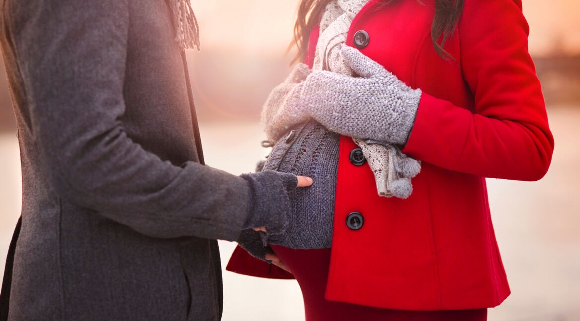 Winter pregnant couple