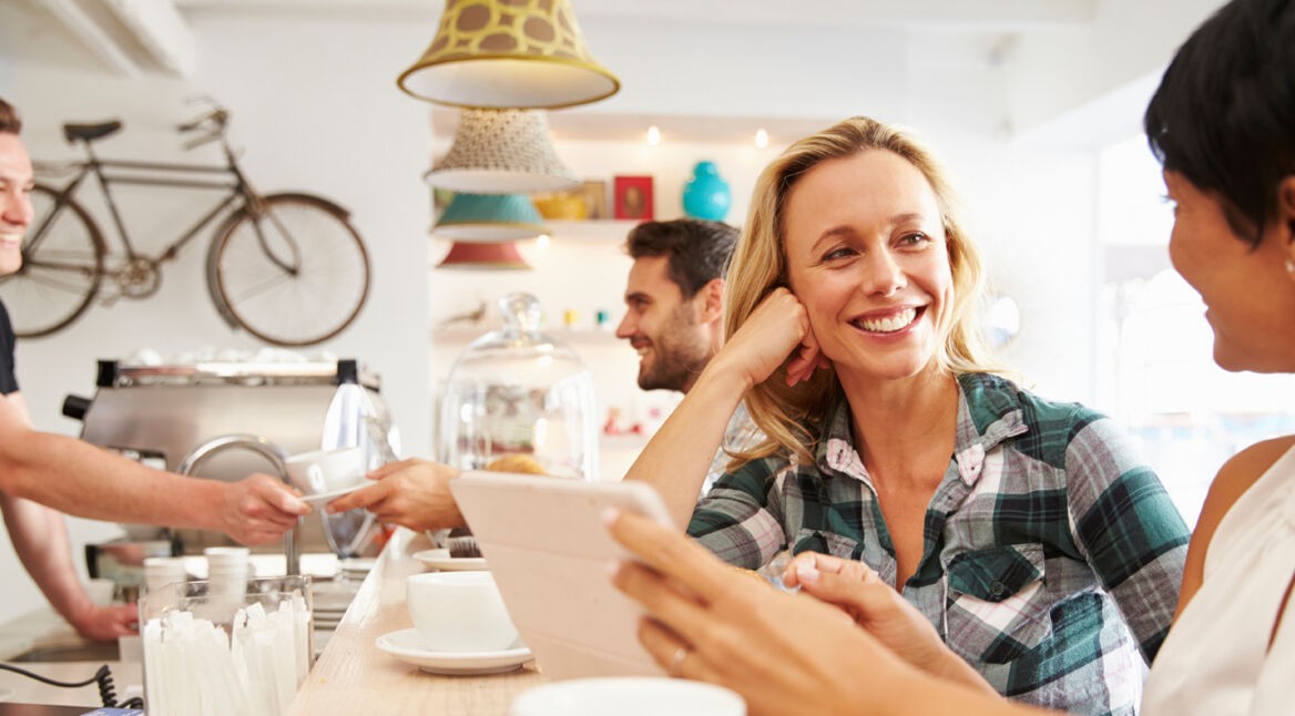 Two women at a meeting in a cafe