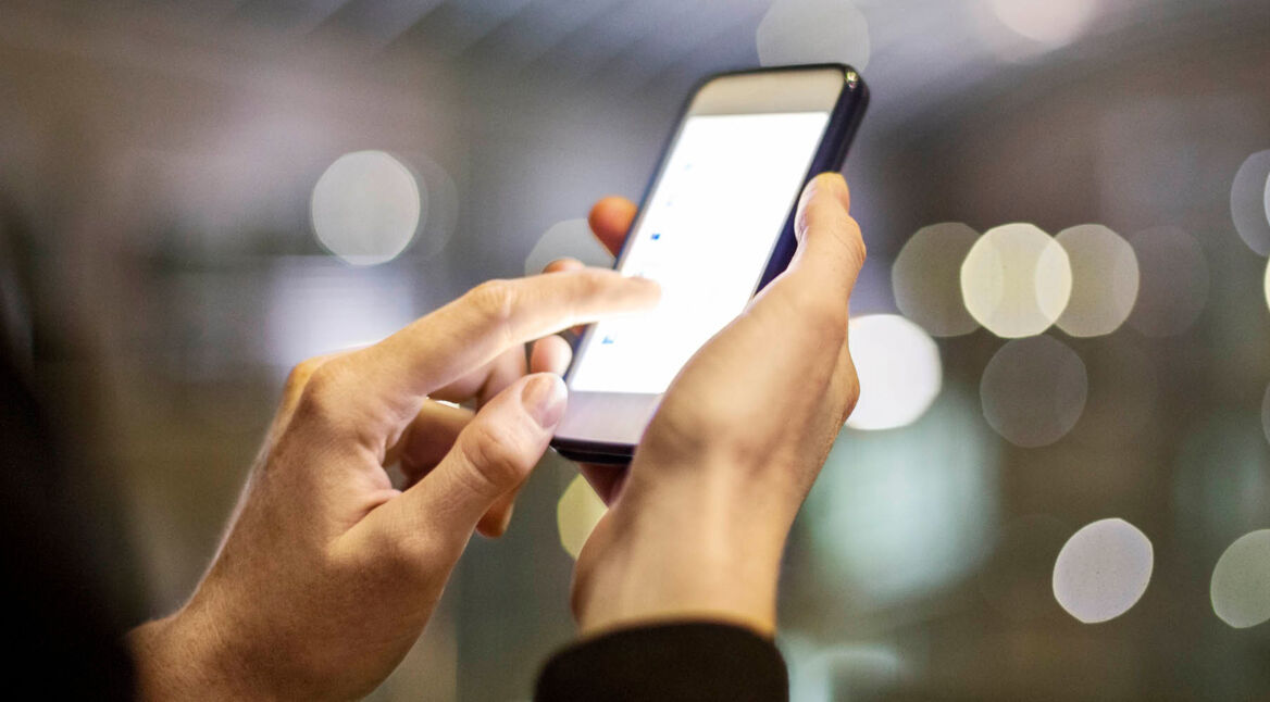 Female using smart phone