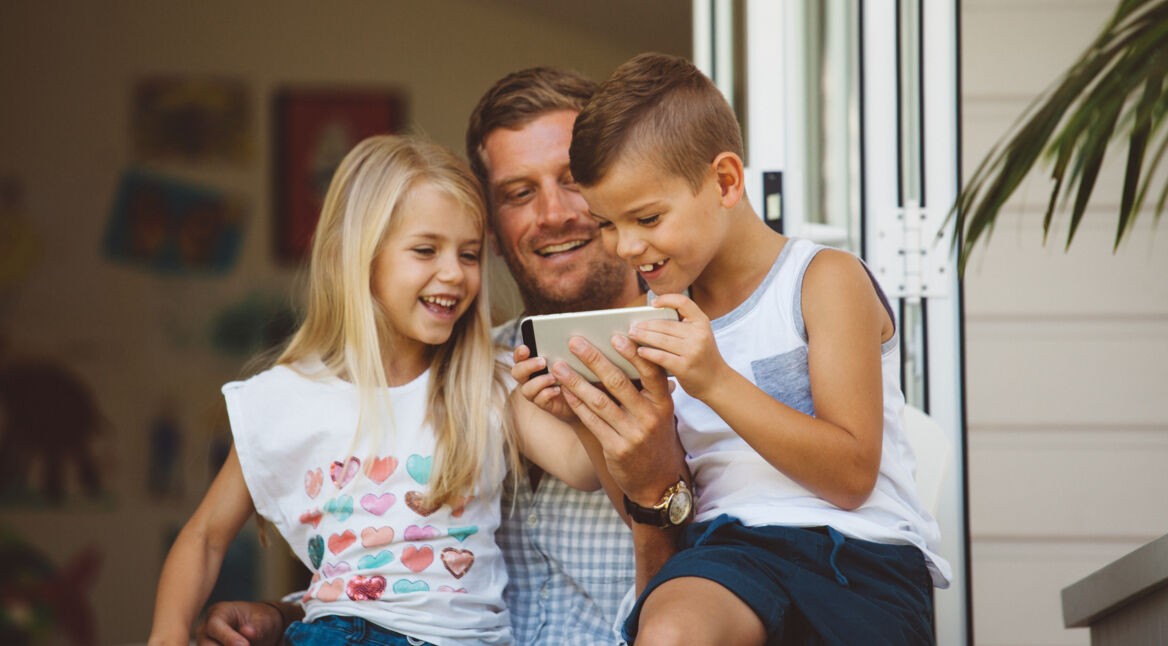family playing on back porch