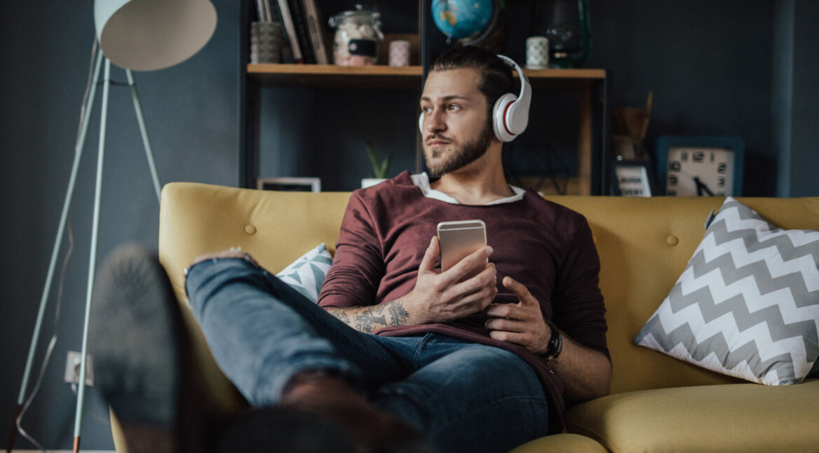 Listening to favorite podcast in relaxing home environment