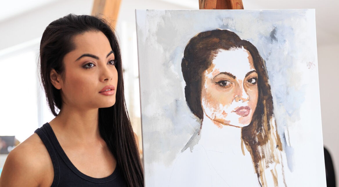 Künstlerin mit Selbstportrait