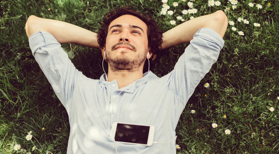 Dreamy man in the grass