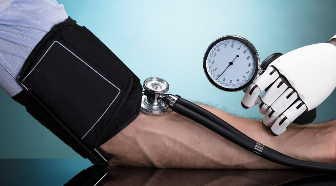 Robot Checking Person's Blood Pressure