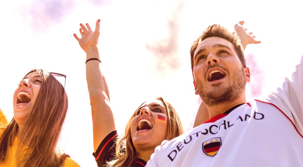 Deutschland supporters at stadium during a football league