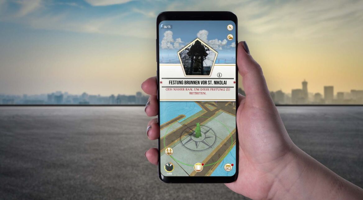 Am Smartphone eine Festung in Harry Potter: Wizards Unite suchen.