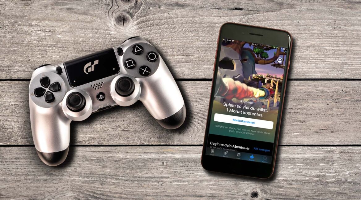 PS4-Controller liegt neben dem iPhone 8 Plus mit Apple Arcade.