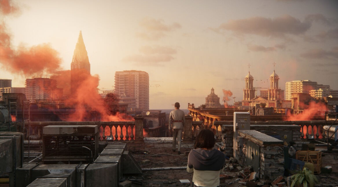 Antón Castillo (Giancarlo Esposito) und sein Sohn Diego auf einem Dach über brennenden Häusern im Spiel "Far Cry 6".