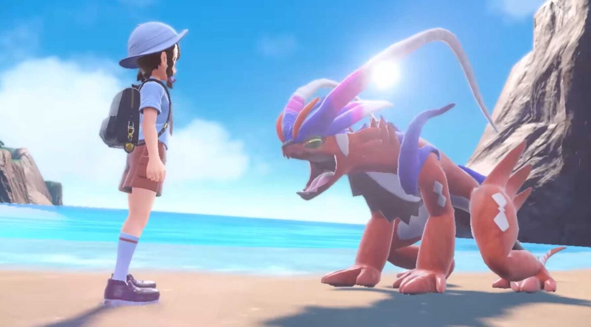 Der Protagonist und das legendäre Pokémon Koraidon stehen am Strand von Paldea