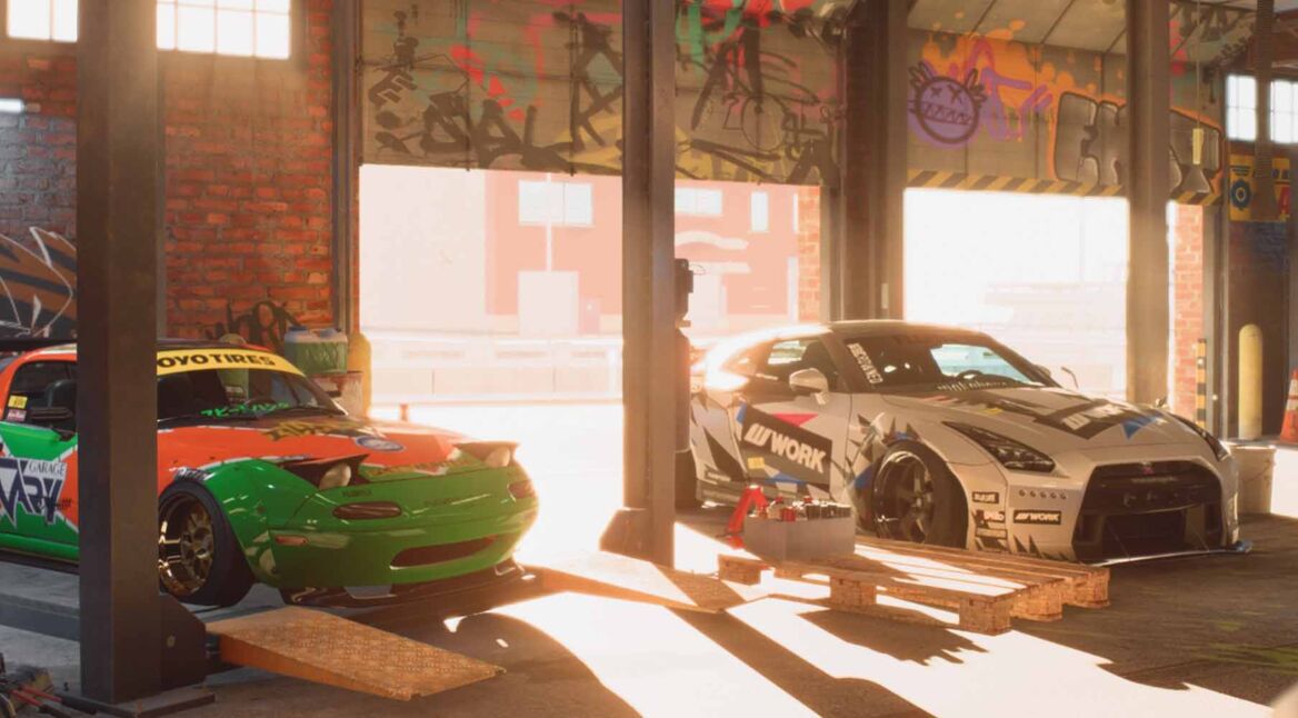 Zwei aufgemotzte Autos stehen in der Garage des Protagonisten aus "Need for Speed Unbound"
