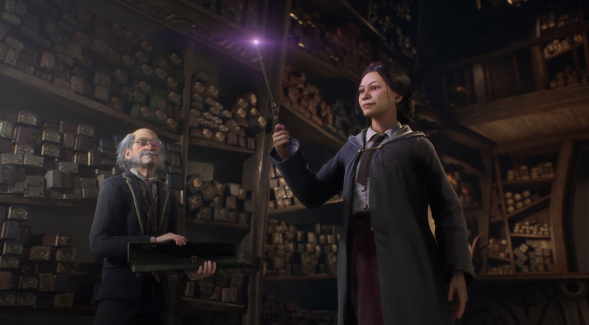 Zauberin hält in Hogwarts Legacy einen Zauberstab in der Hand