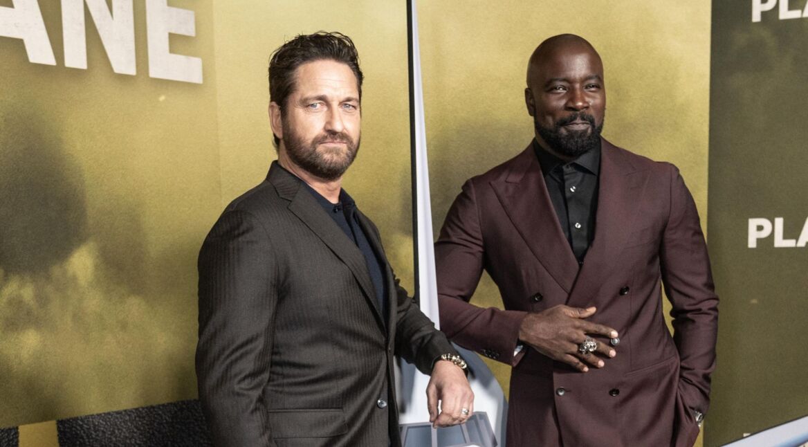 Gerard Butler und Mike Colter posieren bei der Premiere von "Planes" für die Kamera.