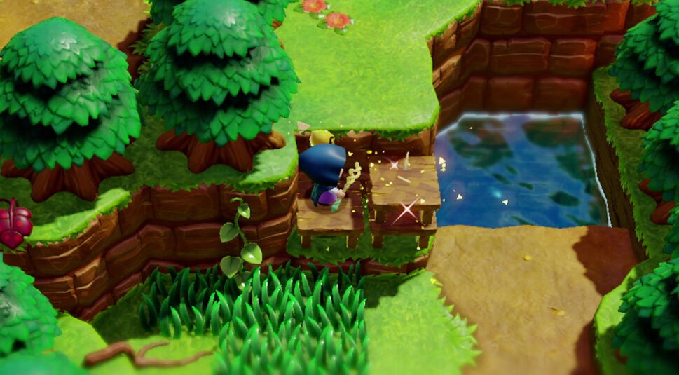 In "The Legend of Zelda: Echoes of Wisdom" springt die Spielfigur Prinzessin Zelda von einem Tisch auf den anderen. Sie befindet sich in einer grünen Landschaft und muss einen Hag hinauf gelangen. Sie hat einen Zauberstab in der Hand , mit dem sie die Holztische kopiert und übereinander gestapelt hat, sodass sich eine Treppe bildet.