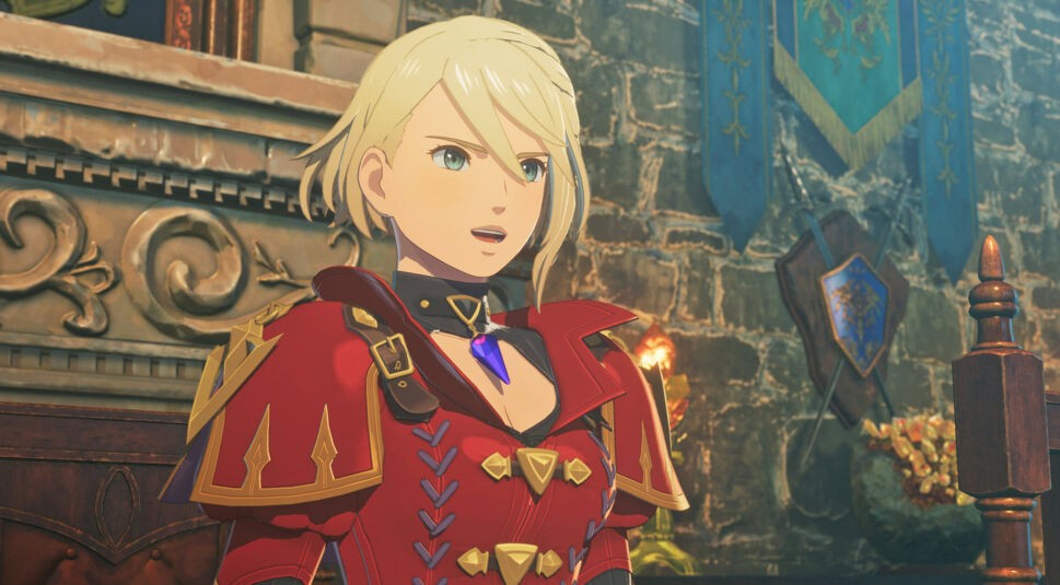 In einer Szene aus Monster Hunter Stories 3 steht Prinzessin Eleanor aus Vermeil in einem prunkvollen Thronsaal. Sie trägt eine auffällige rote Rüstung mit goldenen Verzierungen und ein violettes Schmuckamulett. Ihr entschlossener Gesichtsausdruck unterstreicht ihre Autorität. Im Hintergrund hängen Banner und ein Wappenschild.