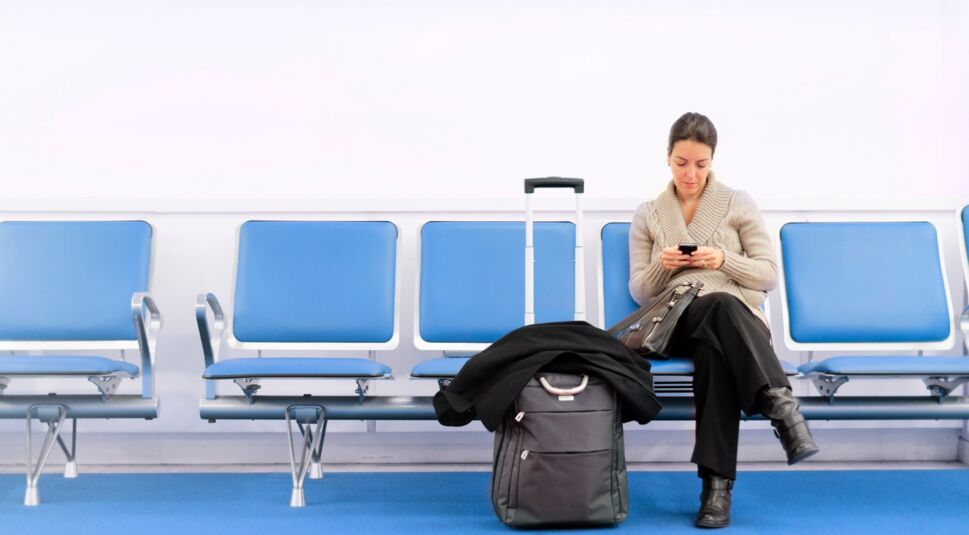 Waiting Traveller Using Smartphone