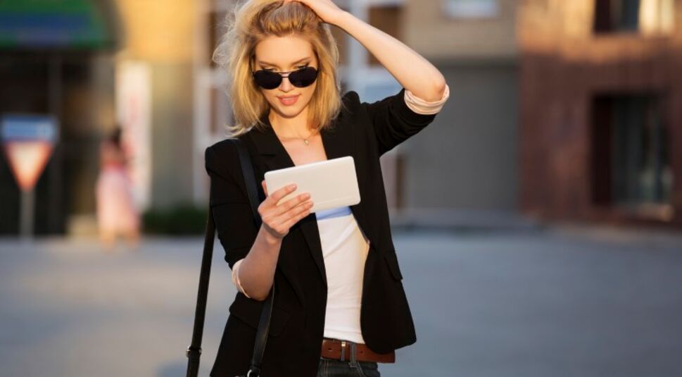 Young business woman using a digital tablet computer