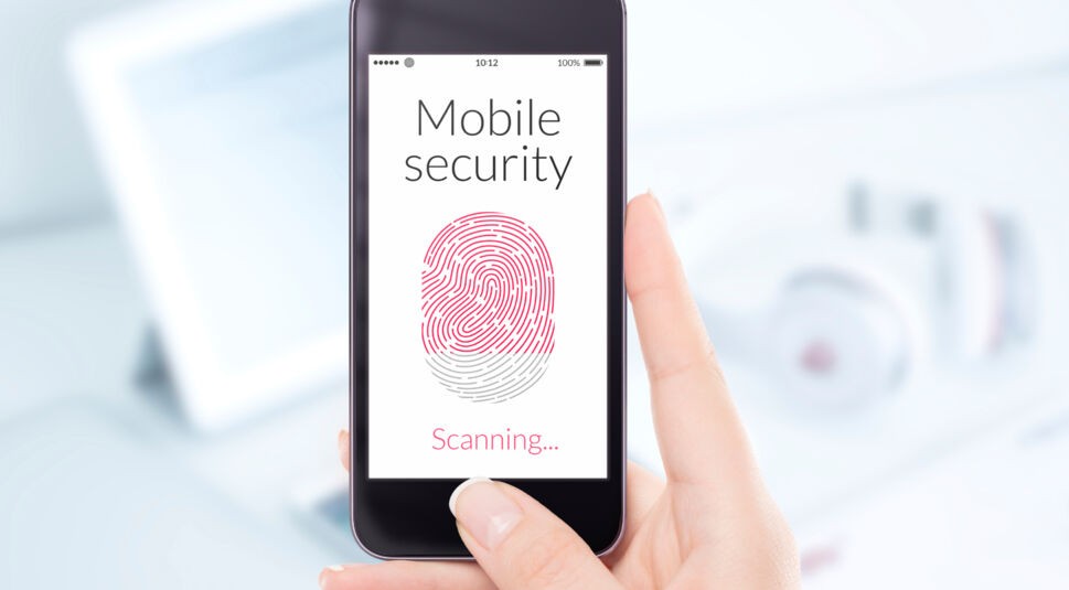 Close up mobile security smartphone fingerprint scanning