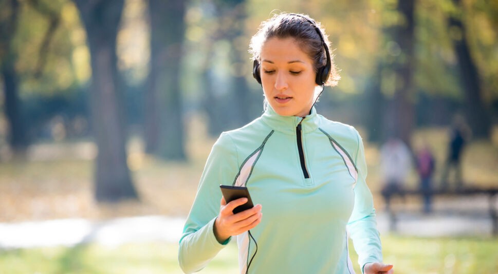 Woman jogging and listening music