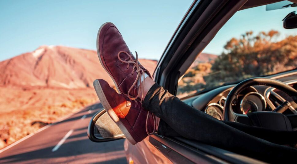 Female legs on the vechicle door