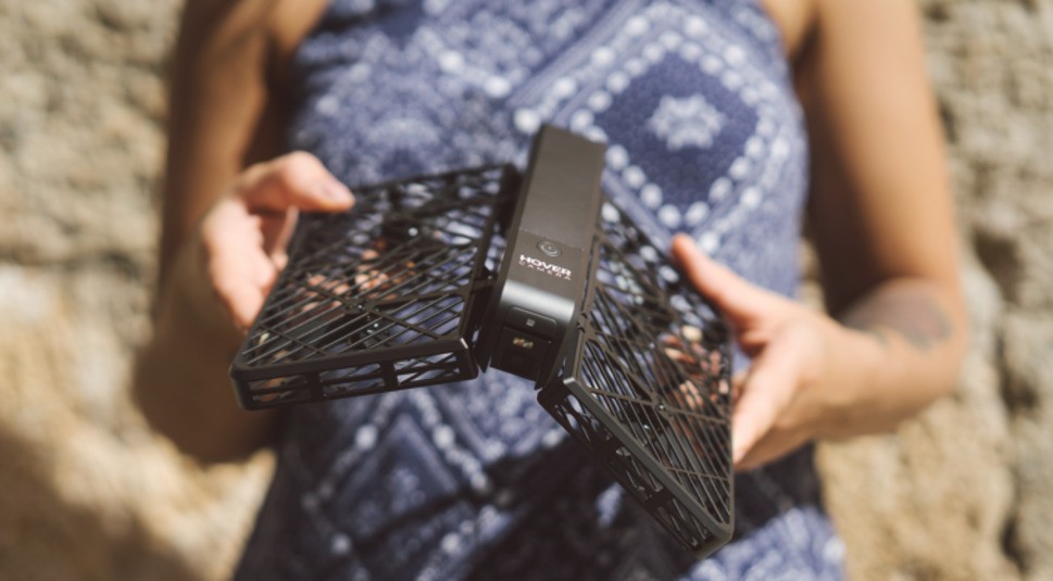 hover-camera-passport-folded-by-girl-edited
