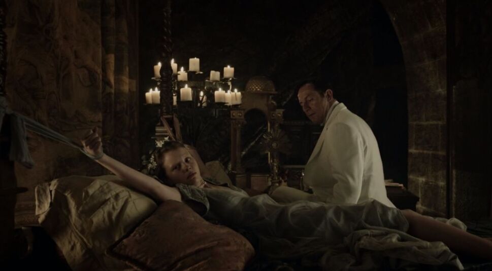 Mia Goth, Jason Isaacs