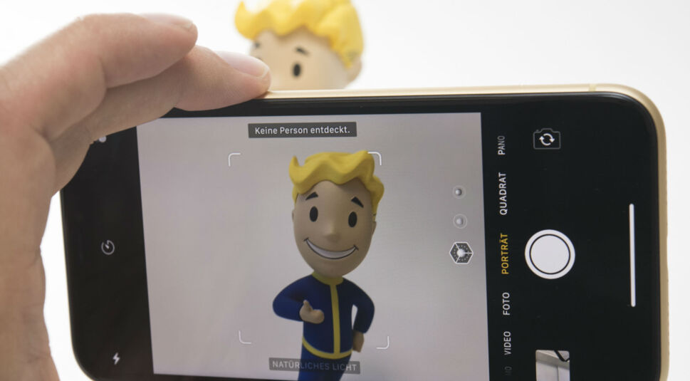 Mit der iPhone-Kamera ein Foto machen.