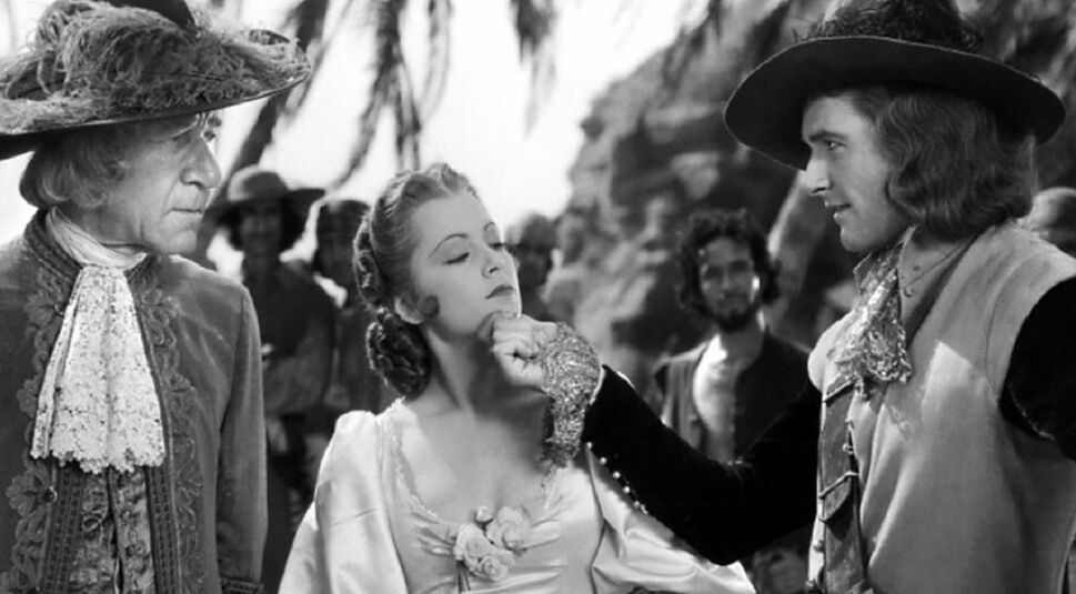 Errol Flynn und Olivia de Havilland in Unter Piratenflagge | © Warner Bros.