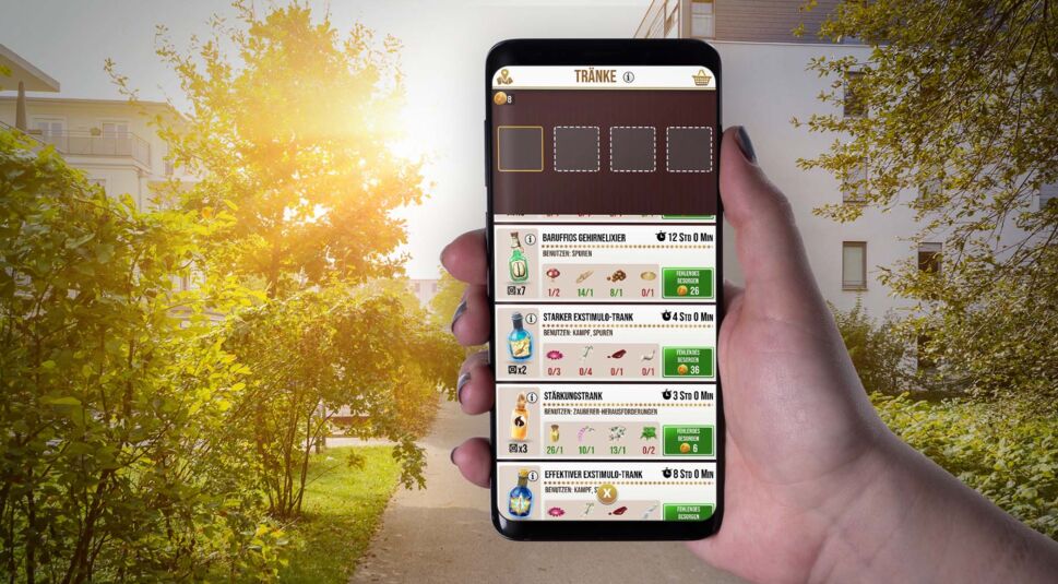 Am Smartphone in Harry Potter: Wizards Unite einen Trank brauen.