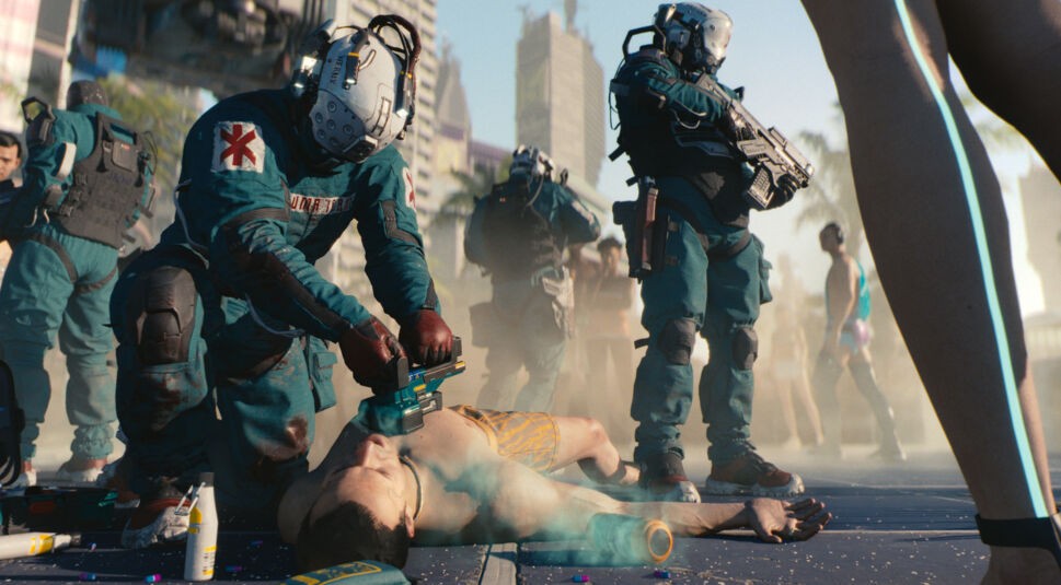  Rettungskräfte beleben Cyberpunk-Fan wieder, nachdem dieser von der Terminverschiebung erfuhr.