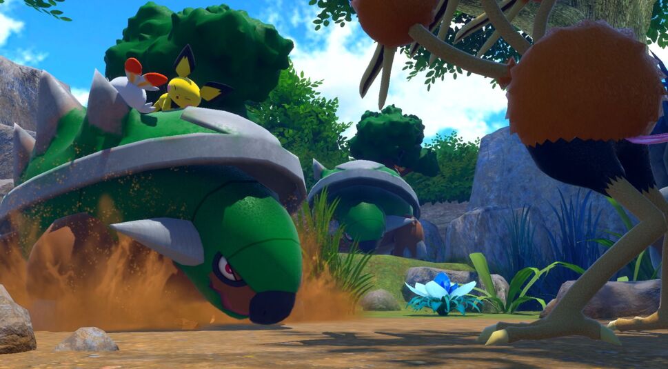 Mehrere Pokémon stehen sich in einem Wald im Spiel "New Pokémon Snap" gegenüber.