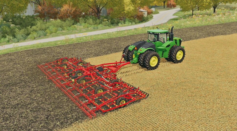 Ein Traktor pflügt ein Feld im Spiel Landwirtschafts-Simulator 22