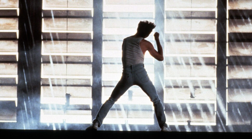 Kevin Bacon in Footloose am Tanzen
