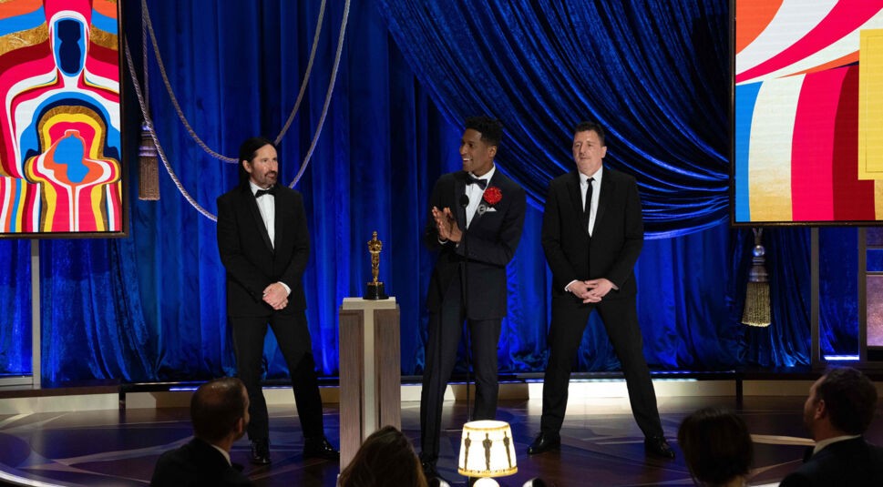 Trent Reznor, Jon Batiste, Atticus Ross auf der Oscar Bühne
