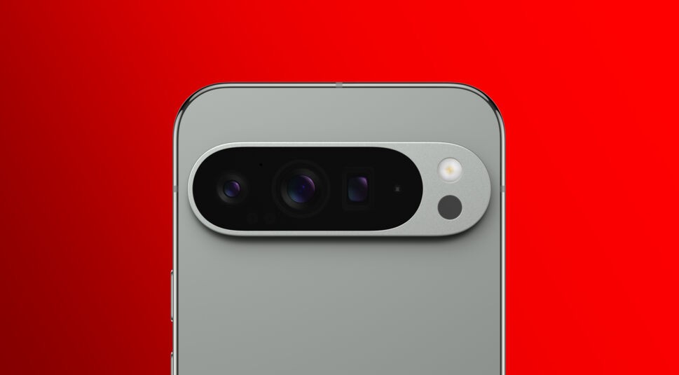 uf dem Bild ist die Kameraeinheit des Google Pixel 9 Pro XL aus der Google Pixel 9 Reihe bei Vodafone zu sehen. Das Smartphone ist in der Farbvariante Hazel (gedecktes Grün) vor einem leuchtend roten Hintergrund dargestellt. Die Kameraeinheit besteht aus drei Linsen und einem LED-Blitz, die horizontal in einem abgerundeten Modul angeordnet sind.