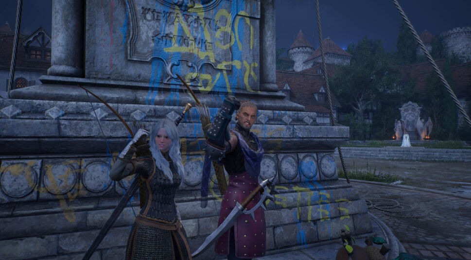 Zwei Spieler:innen stehen an einem Brunnen und zeigen die Siegergeste