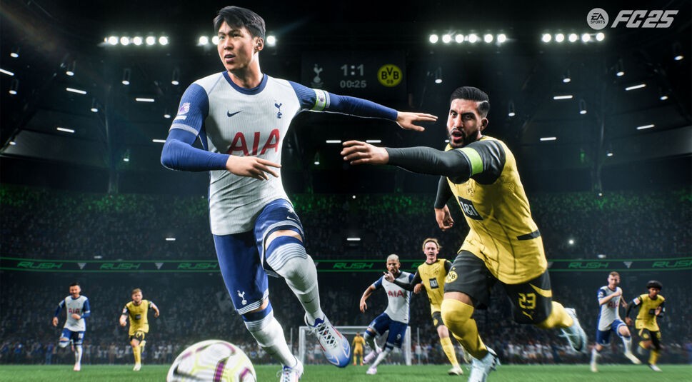 Auf dem Bild vom EA FC 25-Test ist Son Heung-min, der für Tottenham Hotspur spielt, im Zweikampf mit Emre Can von Borussia Dortmund zu sehen. Son trägt das weiße Tottenham-Trikot mit der Aufschrift "AIA" und führt den Ball, während der Dortmunder Spieler im gelben Trikot versucht, ihn zu blocken. Im Hintergrund verfolgen weitere Spieler das Geschehen, und das Stadion ist voll mit jubelnden Fans. Das Spiel steht 1:1, wie die Anzeigetafel im Hintergrund zeigt.