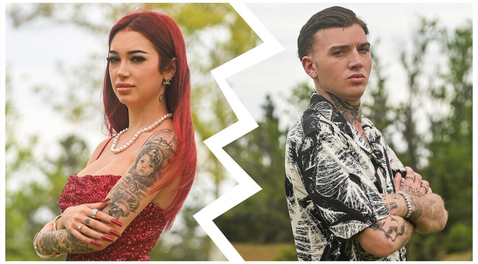 Auf dem Bild in dem Artikel zu den Prominent getrennt Staffel 4 Paaren Paare sind Ariel und Giuliano zu sehen, getrennt durch eine gezackte Linie. Ariel trägt ein glitzerndes rotes Kleid, Perlenschmuck und zeigt ihre tätowierten Arme. Giuliano steht ihr gegenüber in einem gemusterten Hemd, ebenfalls mit sichtbaren Tattoos und ernstem Blick. Beide posieren mit verschränkten Armen vor einem natürlichen Hintergrund.