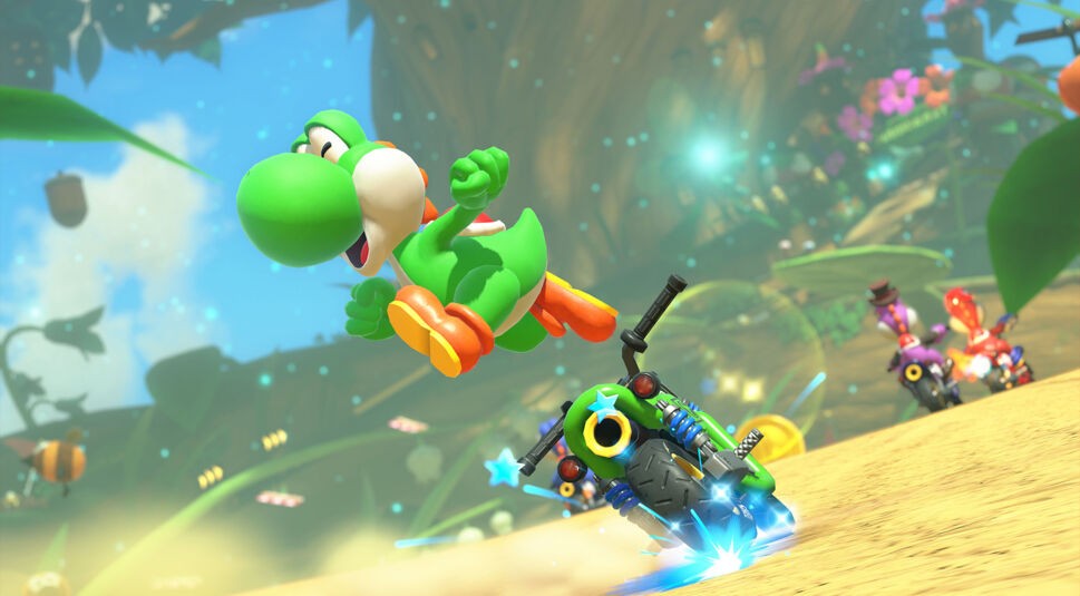 Auf dem Bild in dem Artikel zum Mario Kart World-Test springt Yoshi in die Luft. Weitere Fahrer:innen sind im Hintergrund zu sehen.