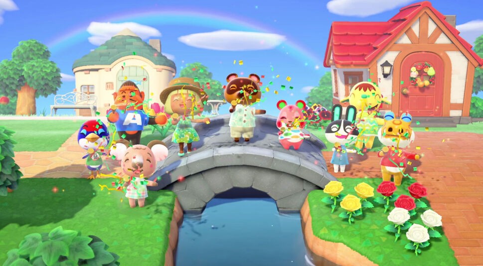 In dieser fröhlichen Szene aus Animal Crossing: New Horizons feiern tierische Dorfbewohner und der Spielercharakter auf einer Brücke unter einem Regenbogen. Konfetti fliegt durch die Luft, und bunte Häuser sowie Blumen schmücken den Hintergrund. Die fröhliche Stimmung spiegelt die Vorfreude auf Animal Crossing für die Switch 2 perfekt wider.
