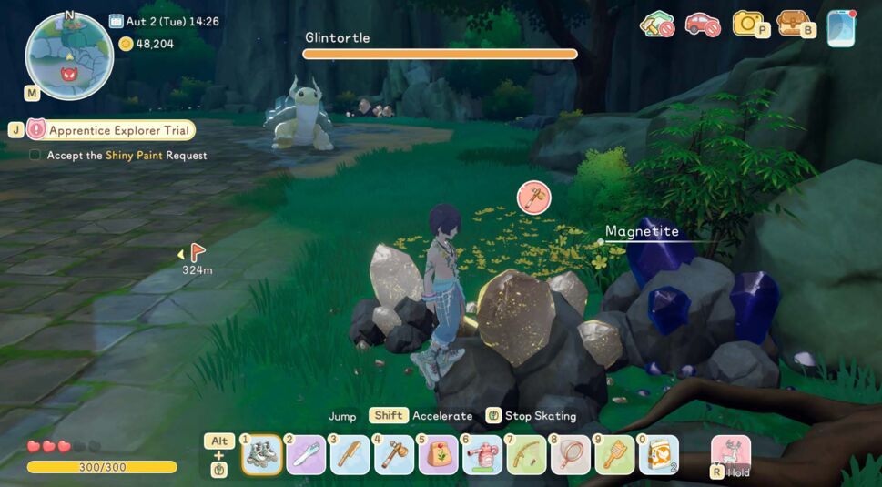 Spielfigur steht nachts vor einem Magnetite-Vorkommen in „Starsand Island“, während im Hintergrund eine Glintortle zu sehen ist.