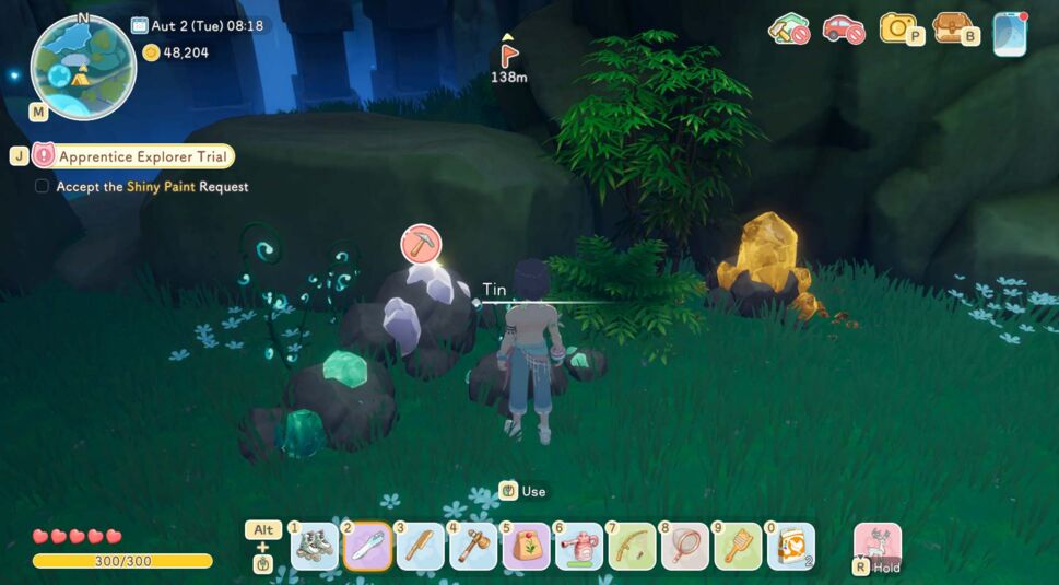 Ein:e Spieler:in steht vor einem Tin-Erzvorkommen und ist umgeben von leuchtenden Kristallen.